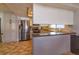 Modern kitchen with stainless steel appliances and dark countertops at 1354 Tierra Cir, Winter Park, FL 32792