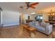 Spacious living room with hardwood floors and comfortable seating at 1354 Tierra Cir, Winter Park, FL 32792