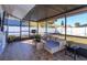 Screened patio with seating area, providing outdoor enjoyment at 1354 Tierra Cir, Winter Park, FL 32792