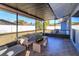 Relaxing screened porch with tiled floor and comfy seating at 1354 Tierra Cir, Winter Park, FL 32792
