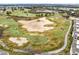 Aerial view of community golf course at 1368 Centre Court Ridge Dr # 104, Reunion, FL 34747