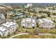 Aerial view of community, showing tennis courts and nearby amenities at 1368 Centre Court Ridge Dr # 104, Reunion, FL 34747