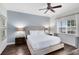 Spacious bedroom with a king-size bed and plenty of natural light at 1368 Centre Court Ridge Dr # 104, Reunion, FL 34747