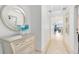 Bright condo entryway with mirror and dresser at 1368 Centre Court Ridge Dr # 104, Reunion, FL 34747