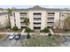 Condo building exterior with parking at 1368 Centre Court Ridge Dr # 104, Reunion, FL 34747