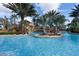 Community lazy river with waterfall feature at 1368 Centre Court Ridge Dr # 104, Reunion, FL 34747