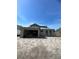 The backyard is under construction with cinderblock walls and an open space ready to be designed at 1417 Miller Ave, Winter Park, FL 32789