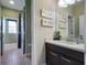 Guest bathroom with single vanity and tub/shower combo at 14442 Avenue Of The Rushes, Winter Garden, FL 34787