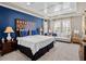 Bright and airy bedroom with a large bed, sitting area, and stylish decor at 14442 Avenue Of The Rushes, Winter Garden, FL 34787