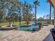 Relaxing pool and spa with lake view and fountain at 14442 Avenue Of The Rushes, Winter Garden, FL 34787