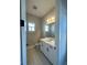 Clean bathroom with white cabinets and a quartz countertop at 16337 Silver Grove Blvd, Winter Garden, FL 34787