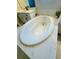 Luxurious bathroom featuring an oval soaking tub with white marble-style tile at 16337 Silver Grove Blvd, Winter Garden, FL 34787