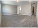 Spacious bedroom with plush carpeting and an ensuite bathroom at 16337 Silver Grove Blvd, Winter Garden, FL 34787