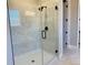 Modern shower with sleek glass enclosure and stylish tile, offering a refreshing and contemporary bathing experience at 16337 Silver Grove Blvd, Winter Garden, FL 34787