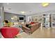 Open-concept living room with hardwood floors and contemporary decor at 1901 Lake Sue Dr, Orlando, FL 32803