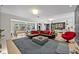 Spacious living area flows into dining space at 1901 Lake Sue Dr, Orlando, FL 32803
