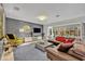 Open-concept living room with hardwood floors at 1901 Lake Sue Dr, Orlando, FL 32803