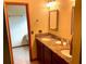 Double vanity bathroom with granite countertops at 1938 Gamboge Dr, Orlando, FL 32822