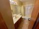 Clean bathroom with shower/tub combo and vanity at 1938 Gamboge Dr, Orlando, FL 32822