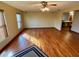 Bright living room with hardwood floors and ceiling fan at 1938 Gamboge Dr, Orlando, FL 32822