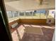 Screened porch features a tile floor and view of the backyard at 1938 Gamboge Dr, Orlando, FL 32822
