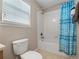 Bathroom features a shower/tub combo and vanity at 2119 Victoria Dr, Davenport, FL 33837