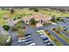 Community clubhouse with parking and landscaping at 2119 Victoria Dr, Davenport, FL 33837
