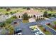 Community clubhouse with parking and landscaping at 2119 Victoria Dr, Davenport, FL 33837