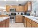 Modern kitchen featuring stainless steel appliances and ample counter space at 2119 Victoria Dr, Davenport, FL 33837
