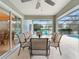 Covered patio with seating area and view of the pool at 2119 Victoria Dr, Davenport, FL 33837