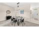 Modern dining room with a six-chair wooden table at 2220 Wyndham Palms Way, Kissimmee, FL 34747
