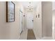 Bright and spacious entryway with tile flooring and neutral decor at 2220 Wyndham Palms Way, Kissimmee, FL 34747