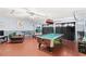 Game room features a pool table and seating area at 2220 Wyndham Palms Way, Kissimmee, FL 34747