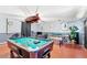 Basement game room with pool table and foosball at 2220 Wyndham Palms Way, Kissimmee, FL 34747