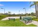Outdoor sand volleyball court with picnic tables at 2220 Wyndham Palms Way, Kissimmee, FL 34747