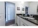 Double vanity bathroom with access to a bedroom at 236 Captiva Dr, Davenport, FL 33896