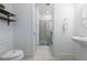 Clean bathroom with single sink vanity and shower at 236 Captiva Dr, Davenport, FL 33896