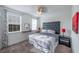 Spacious bedroom with a king-size bed and ensuite bathroom at 236 Captiva Dr, Davenport, FL 33896