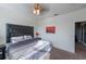 King-size bed in a well-lit bedroom with ensuite access at 236 Captiva Dr, Davenport, FL 33896