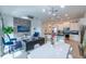 Open concept living space with modern kitchen and dining area at 236 Captiva Dr, Davenport, FL 33896