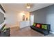 Loft area with a couch and access to other rooms at 236 Captiva Dr, Davenport, FL 33896