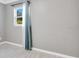 Bright bedroom with tile floors and window at 2901 Primrose Ct, Orlando, FL 32803