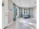 Bright living room featuring light gray walls and tile flooring at 2901 Primrose Ct, Orlando, FL 32803
