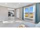 Inviting living room features a window, view to the kitchen, and ample natural light at 2901 Primrose Ct, Orlando, FL 32803