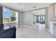 Inviting living space with large windows offering serene views, and stylish flooring at 2901 Primrose Ct, Orlando, FL 32803