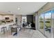 Bright living room featuring sliding glass doors leading to the backyard at 2903 Hudson Hammock Way, Saint Cloud, FL 34773