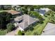 Home's aerial view showing the roof and landscaping at 38633 Lakeview Walk, Lady Lake, FL 32159