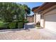 House exterior showcasing a walkway leading to the garage at 38633 Lakeview Walk, Lady Lake, FL 32159