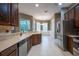 Modern kitchen with stainless steel appliances and breakfast nook at 38633 Lakeview Walk, Lady Lake, FL 32159