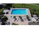 Community pool with surrounding lounge area at 38633 Lakeview Walk, Lady Lake, FL 32159